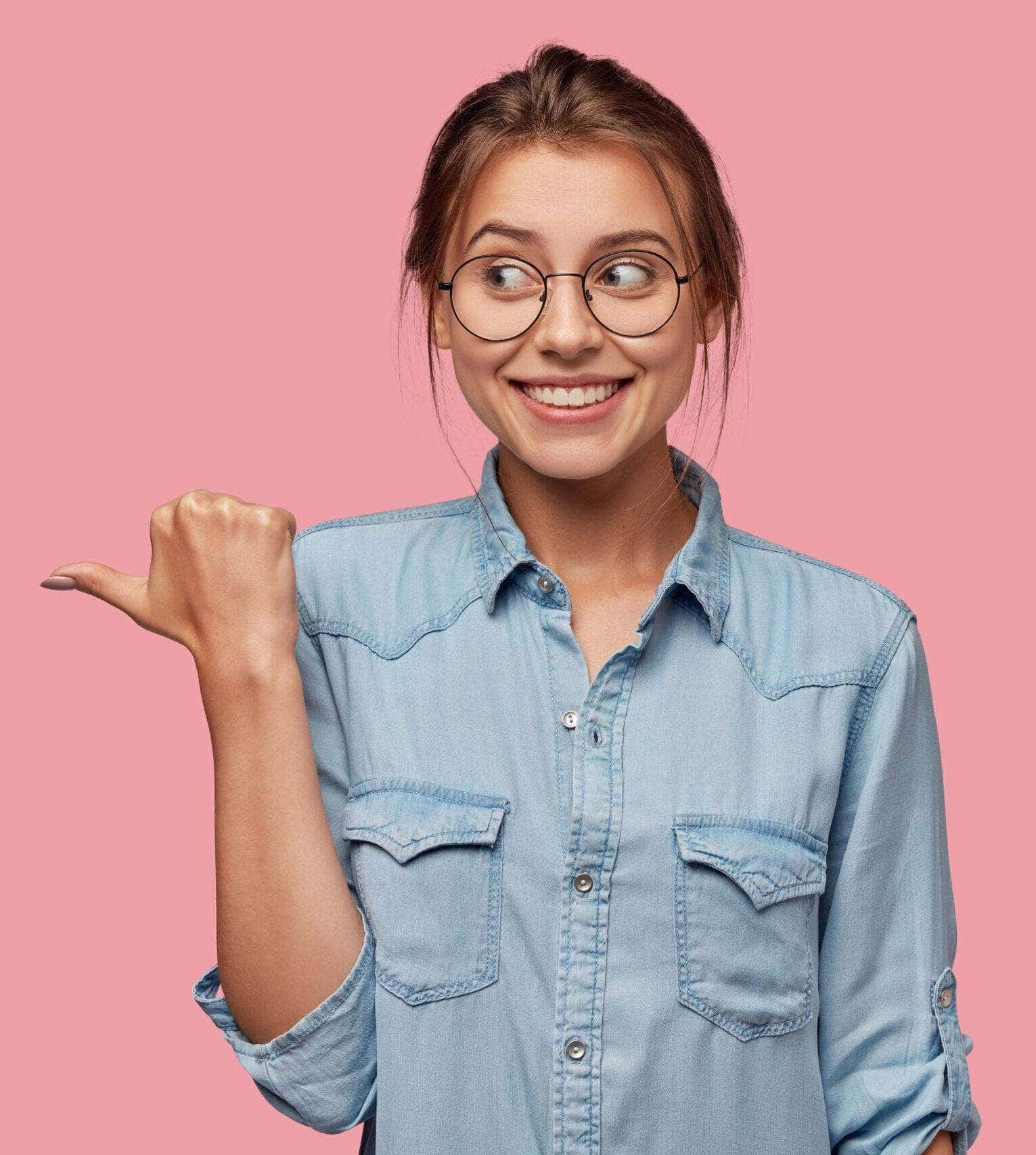 Woman pointing to information beside her